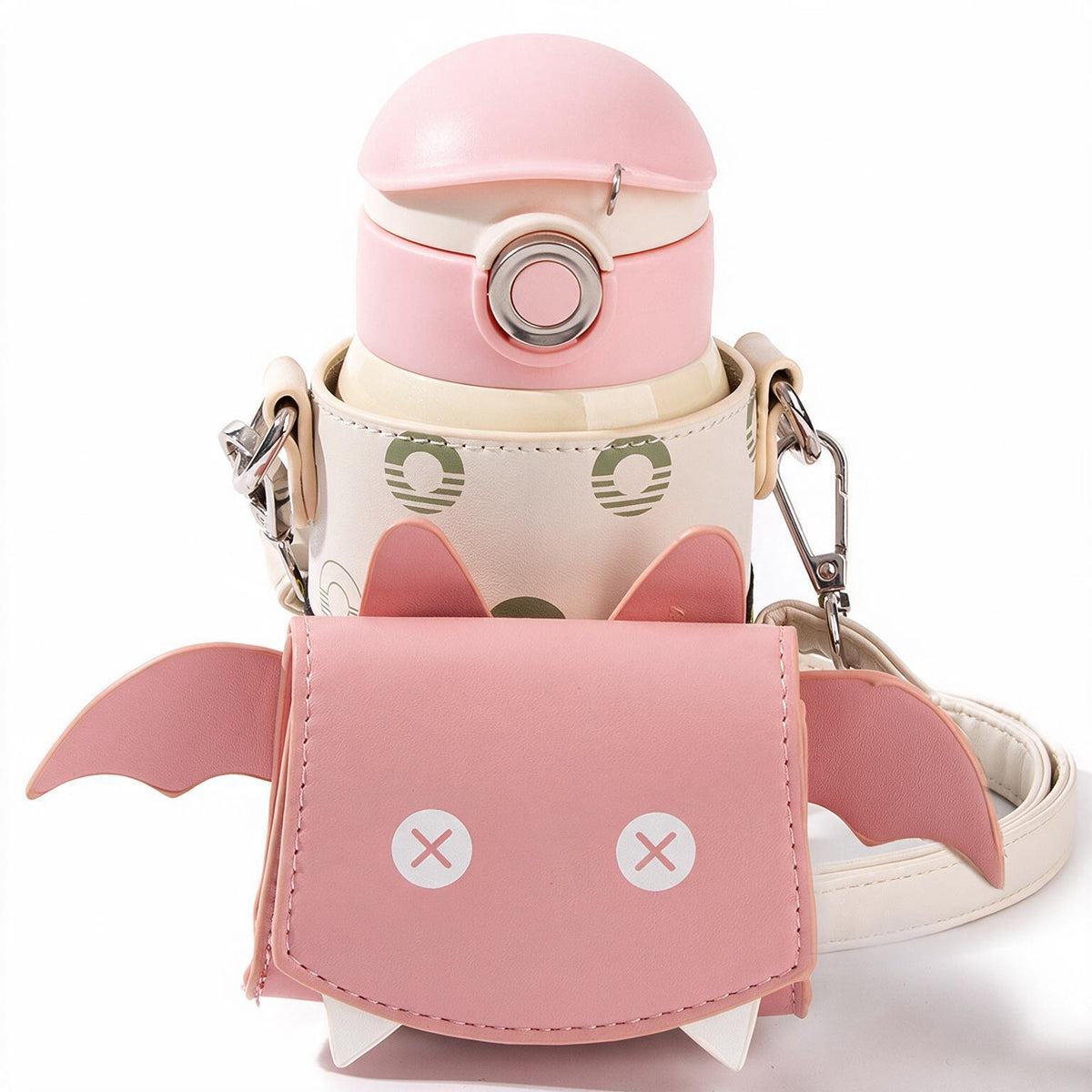 A pink and cream water bottle with a matching shoulder strap and a cute pink bat-shaped pouch in front, set against a clean white background.