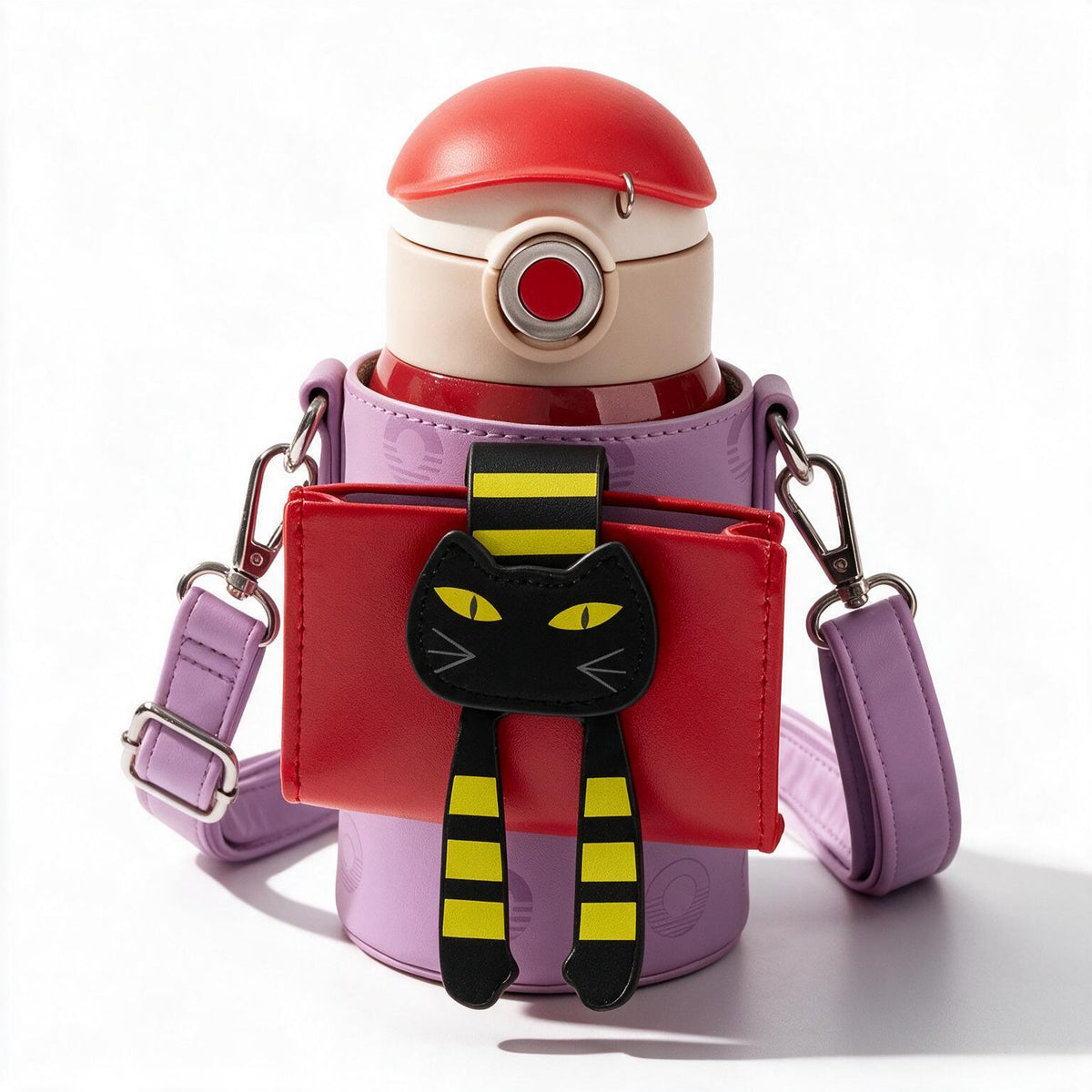 A purple cylindrical water bottle with a red cap and a red crossbody bag attached, featuring a black cat face with yellow eyes and yellow-and-black striped legs. The bag has a purple strap and silver metal hardware, photographed on a clean white background.