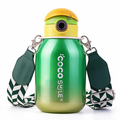 A green gradient water bottle with a yellow lid, featuring the brand name 'COCO SMILE' printed vertically on the front. It has an attached green and white patterned shoulder strap with silver metal clips, set against a plain white background.