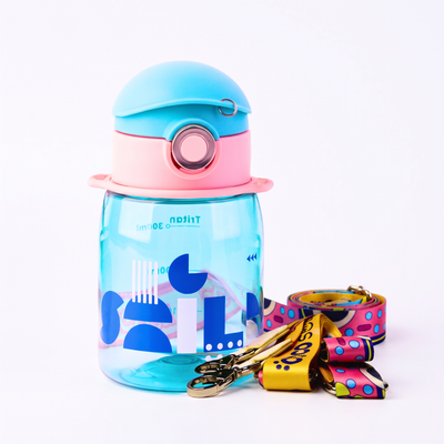 A translucent blue water bottle with a light blue and pink lid, shown on a white background with a colorful patterned strap and gold keychain attached.